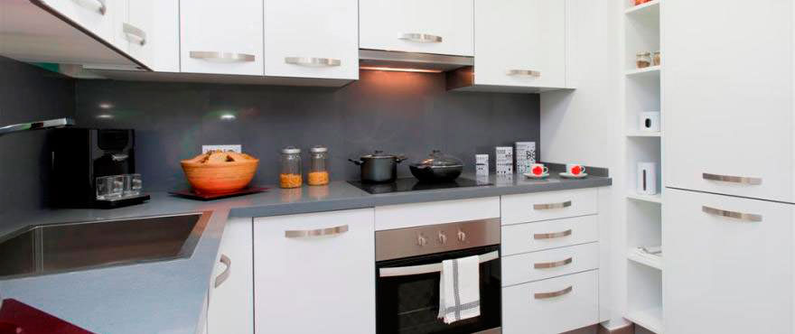 Cozy kitchen open towards living room of apartment for sale in Mallorca