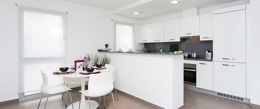 Kitchen and dining room seen from living room in Aires de Pollensa, apartments in Mallorca