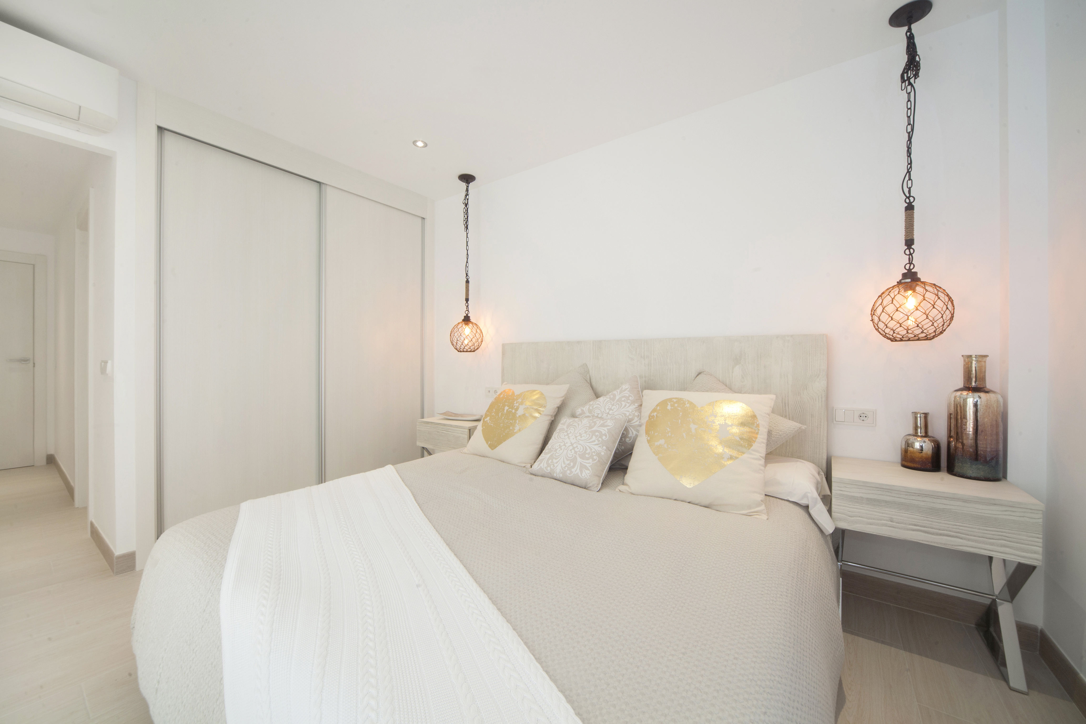 Luminous bedroom of Bahía San Pere apartments