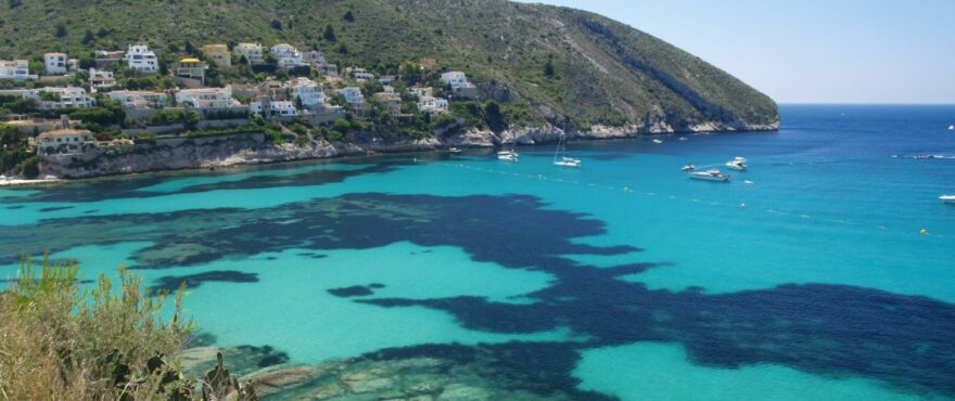 Crystalline waters at the beaches of Moraira, Costa Blanca