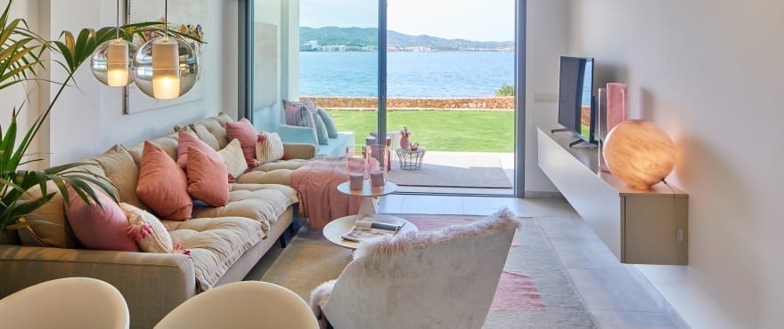 Bright living-dining room at Sunset Ibiza, with a large terrace and sea views