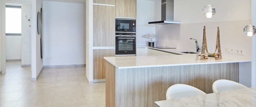 Spacious living-dining room and open plan kitchen at Sunset Ibiza