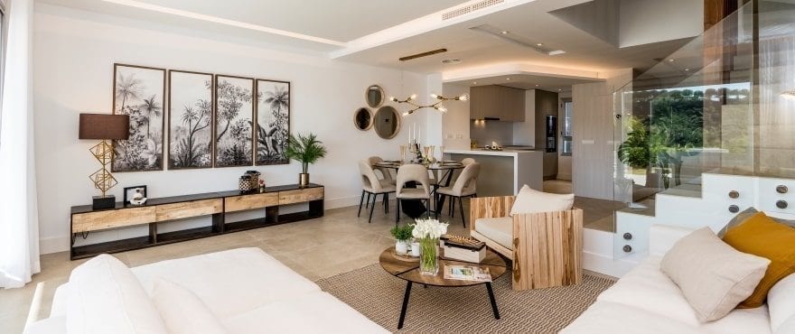 Bright living room with views of the golf course at the new townhouses for sale at Natura, Costa del Sol