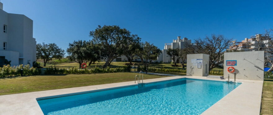 Communal pool and garden at Emerald Greens, San Roque Club