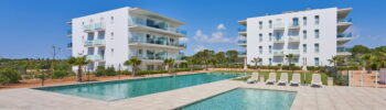 Compass, communal pool and gardens, next to the marina in Cala d´Or