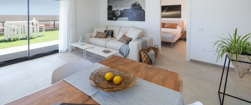 Living room with integrated kitchen at the new development for sale at Iconic