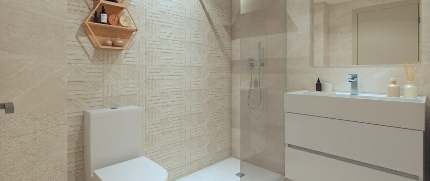 Modernes, voll ausgestattetes Bad mit installierter Duschtrennwand eines Apartments in der Wohnanlage Solana Village