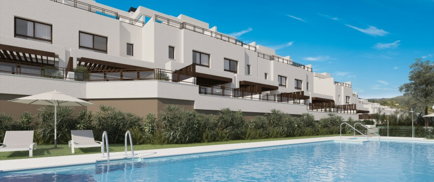 Communal pool and garden at the new homes at Belaria