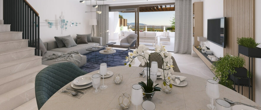 Ljust vardagsrum med utsikt över golfbanor från de nya radhusen till salu i Belaria, Costa del Sol