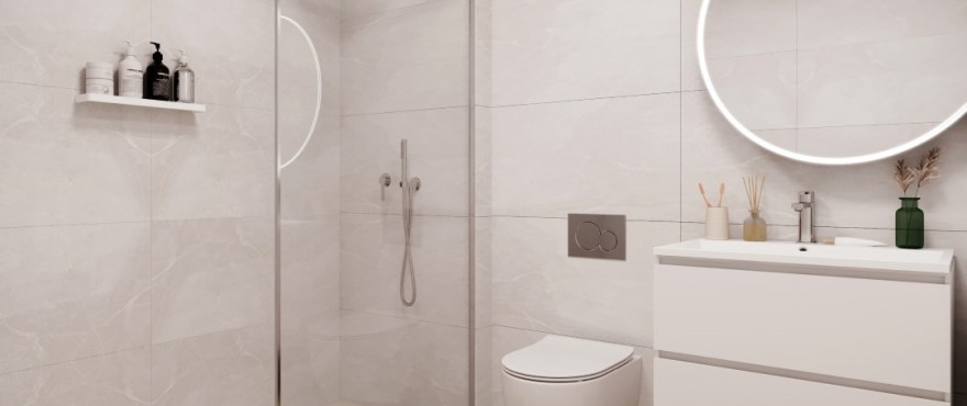 Modernt och komplett inrett badrum med dusch i de nya radhusen i Azur