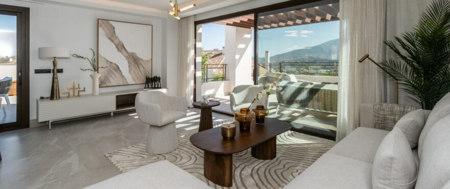 Bright living room with views of the golf course at the new townhouses for sale at The Meadows, Costa del Sol
