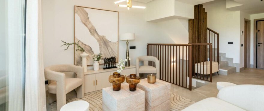Bright living room with views of the golf course at the new townhouses for sale at The Meadows, Costa del Sol.