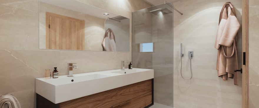 Moderne, ingericht badkamer met douche van de halfvrijstaande woningen in The Meadows