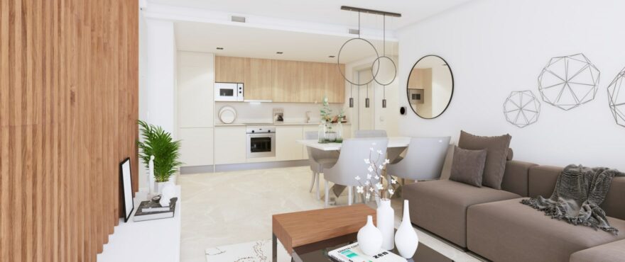 Bright dining room and open-plan kitchen at the new homes at Fuente Lirios