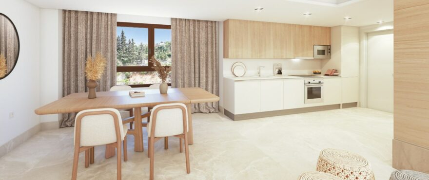 Bright dining room and open-plan kitchen at the new homes at Fuente Lirios