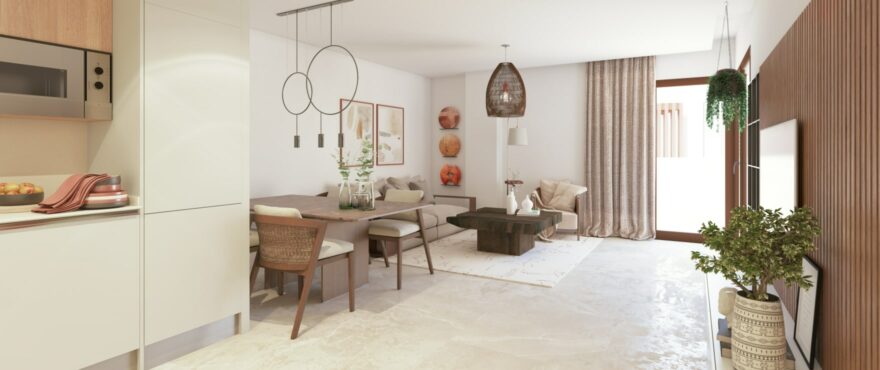 Bright dining room and open-plan kitchen at the new homes at Fuente Lirios