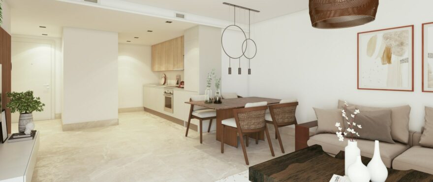 Bright dining room and open-plan kitchen at the new homes at Fuente Lirios